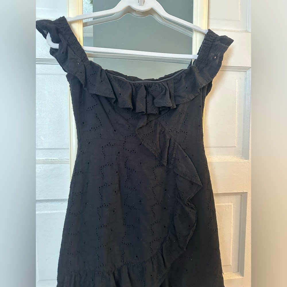 Black off the shoulder eyelet mini with ruffle detail